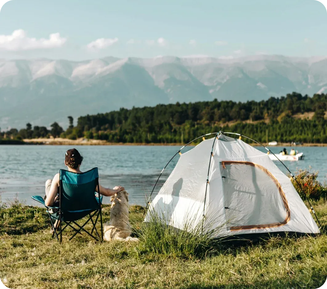Travellers pausing on a mountain road